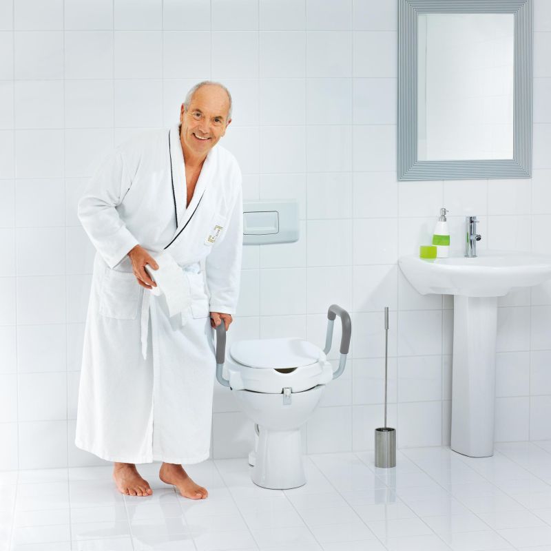 Capac WC cu inaltator Ridder, cu manere de sprijin, pentru seniori, alb, suporta maxim 150Kg, A0072001 Cod 38130 150kg)